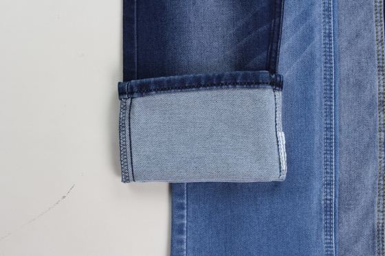 Sản phẩm bán buôn 10 oz màu xanh đậm kéo dài vải denim dệt cho quần jean