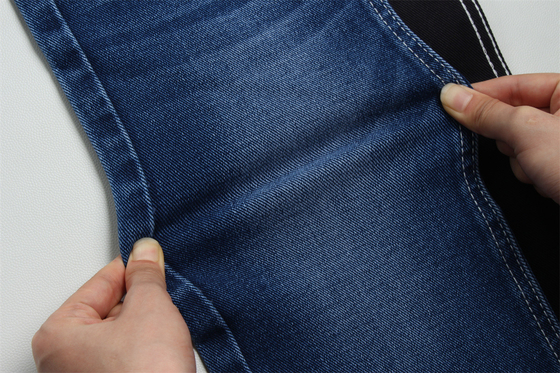 12 oz giá mực thấp kéo dài denim vải cho người đàn ông làm việc mặc quần jean đen mặt sau giá cạnh tranh từ Weilong dệt may